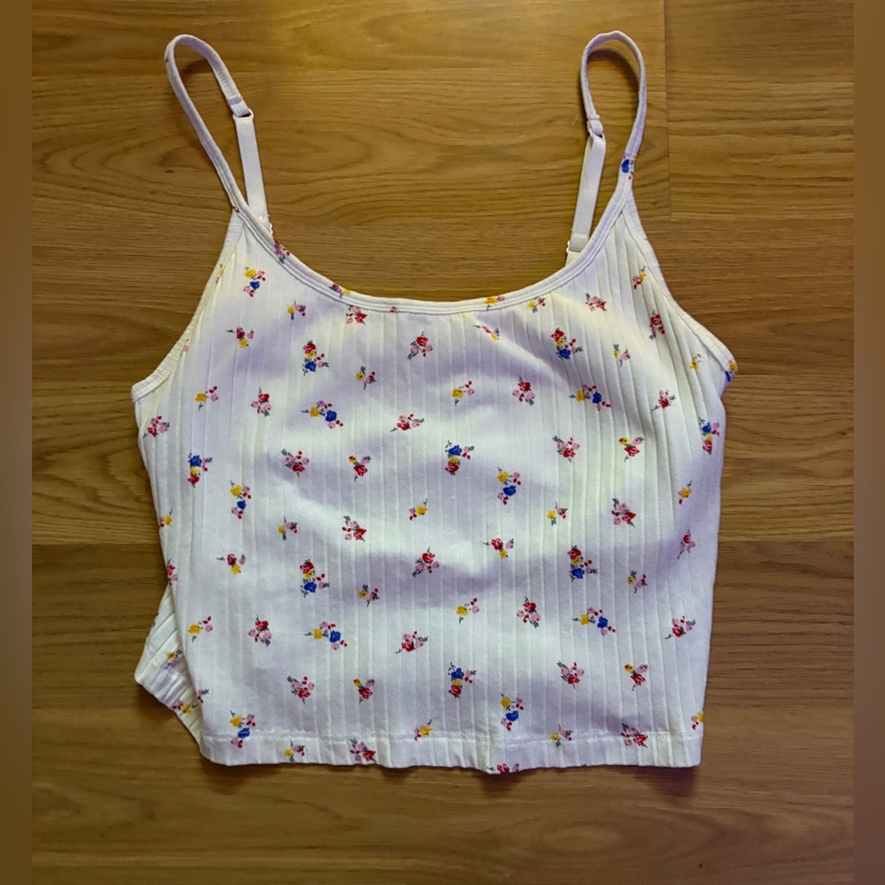 White flower print tank top. cropped. Bra lining. No padding. Worn once.